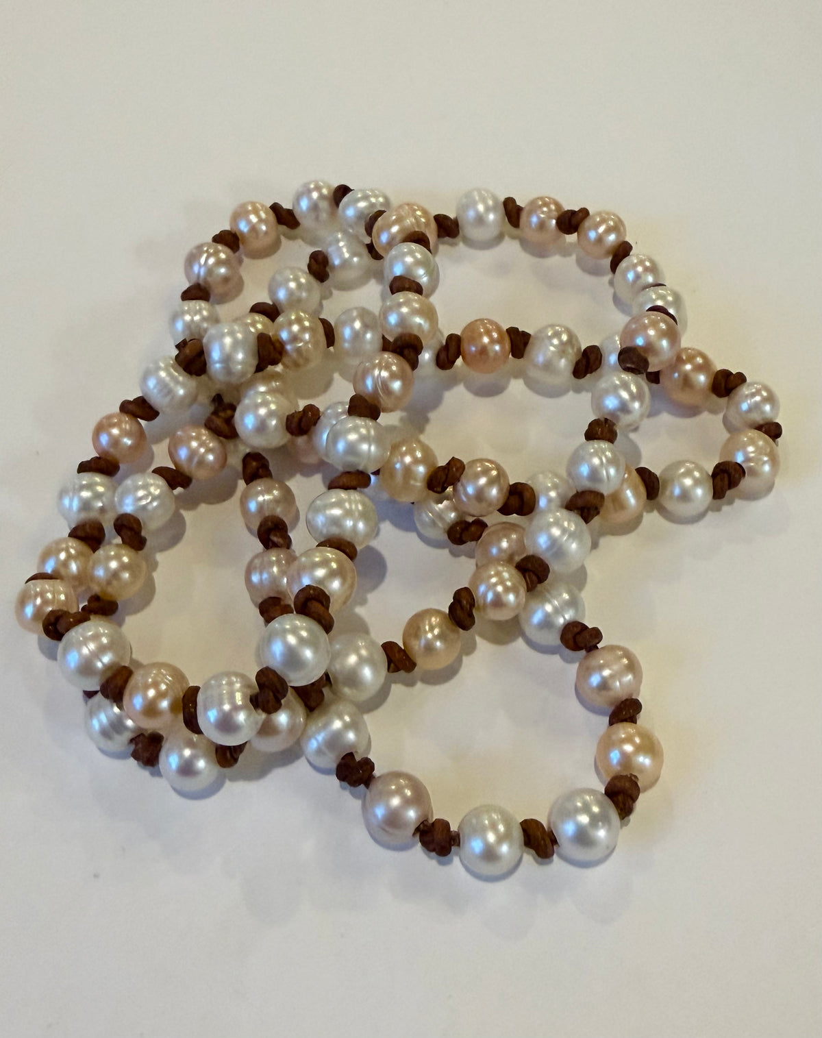 Peach & Cream Freshwater Pearls Knotted on Leather Necklace 32”
