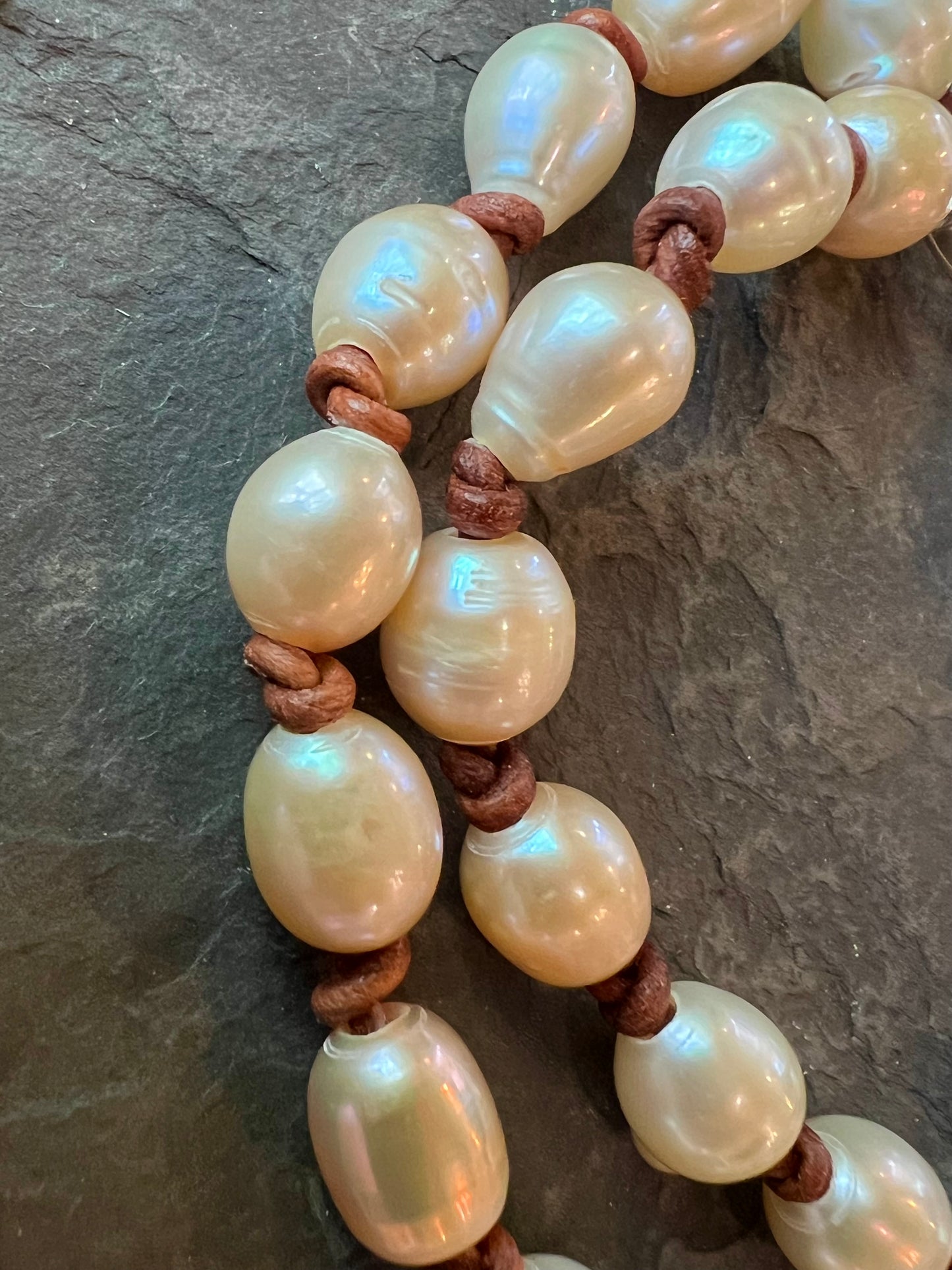 Peachy Freshwater Pearls on Hand Knotted Leather Double Bracelet