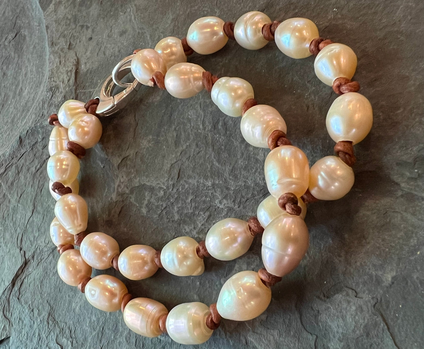 Peachy Freshwater Pearls on Hand Knotted Leather Double Bracelet